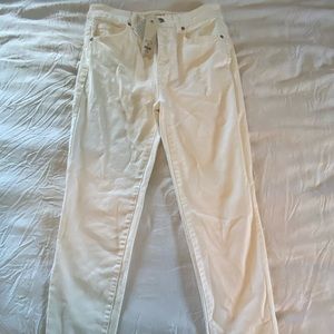 White Skinny jeans with fringe on bottom